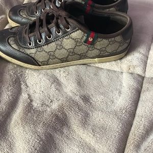worn out Gucci sneakers
